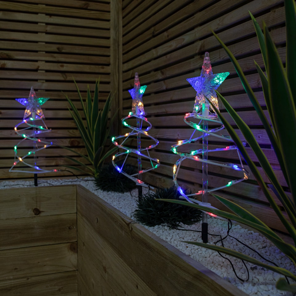 image 1 of 45cm Set of 4 Light up White Spiral Christmas Tree Garden Path Lights with 100 Multi-Coloured LEDs