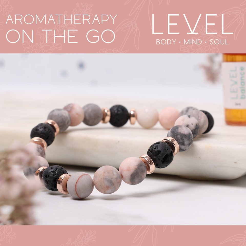 image 1 of LEVEL Wellbeing Lava Bead Aromatherapy Bracelet with SMUG Happiness Oil