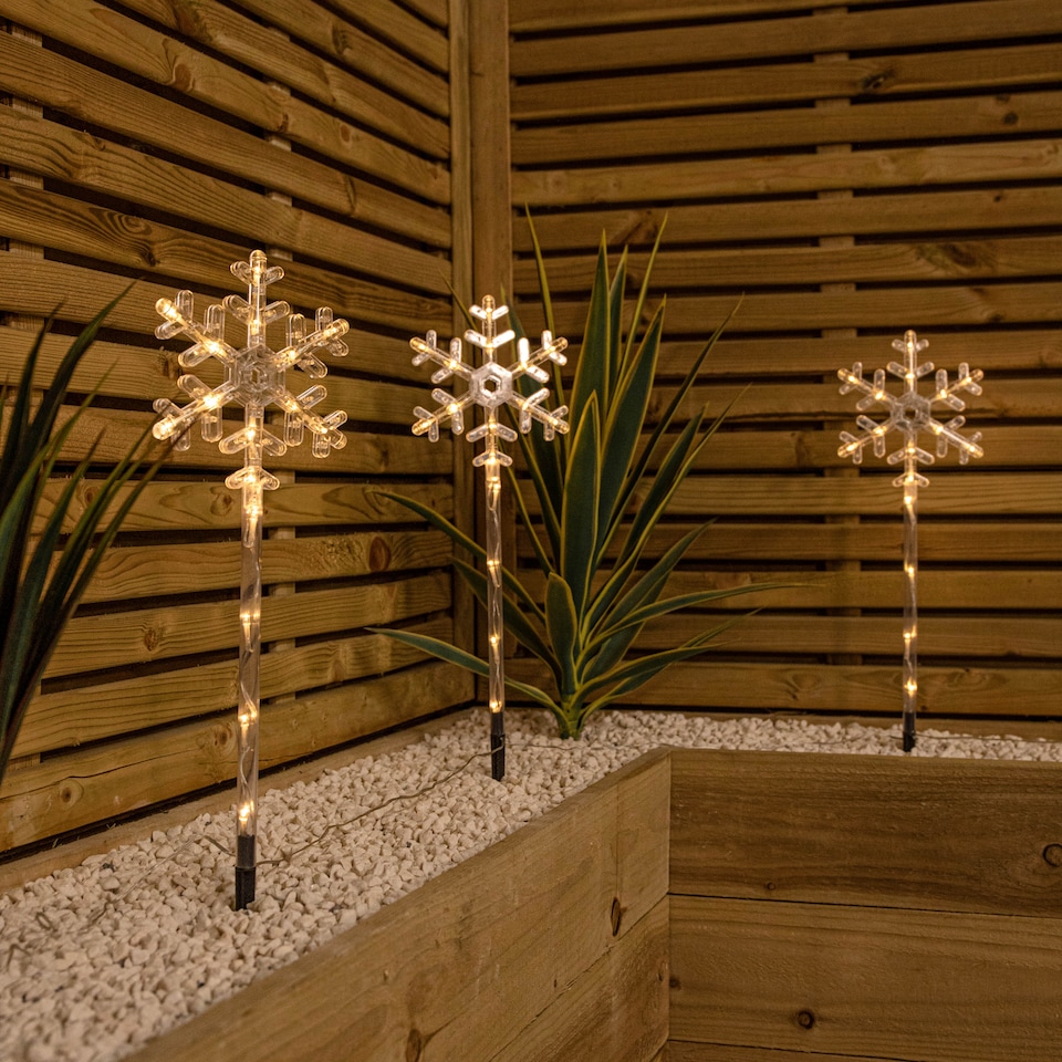 image 1 of 43cm Set of 4 Light up Large Snowflake Christmas Garden Path Lights with 64 Warm White LEDs