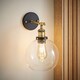 image 2 of ValueLights Sheridan Black and Gold Wall Light Amber Glass Shade