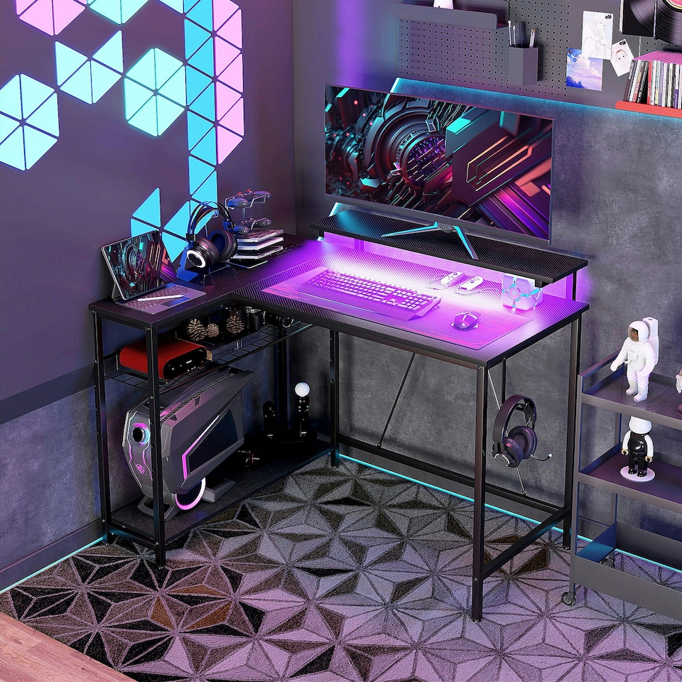image 1 of HOMCOM L Shaped Desk with LED Lights Reversible Corner Gaming Desk with Storage