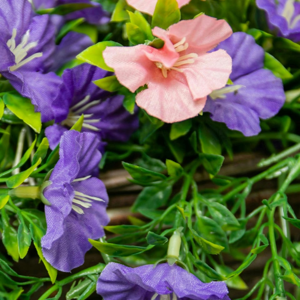 image 1 of Primrose Artificial Petunia Flowers Rattan Hanging Basket Purple Pink 30cm