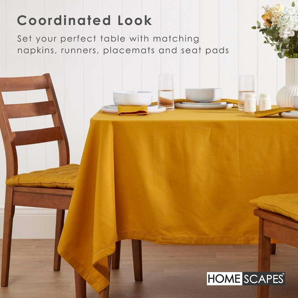 image 1 of Homescapes Mustard Yellow Cotton Round Tablecloth - 178 cm | Yellow | 178cm (70")