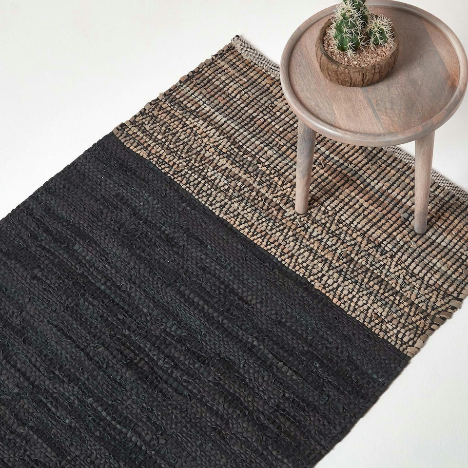 image 1 of Homescapes Black Recycled Leather Handwoven Herringbone Rug - 90 x 150 cm | Black | 90 x 150 cm