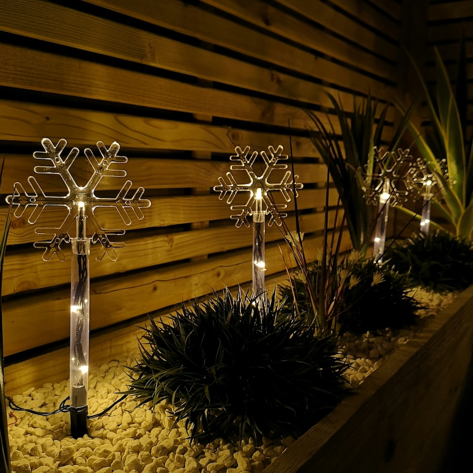 image 1 of Battery Operated Set of 8 Light up Christmas Snowflake Garden Stakes with LEDs