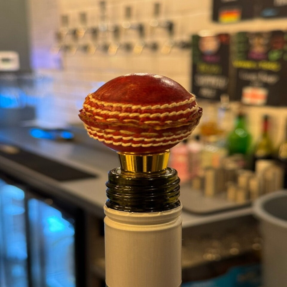image 1 of CRICKET-GIFTS Wine Stopper Real Leather Mini Cricket Ball Suitable for bottles up to 20mm Diameter