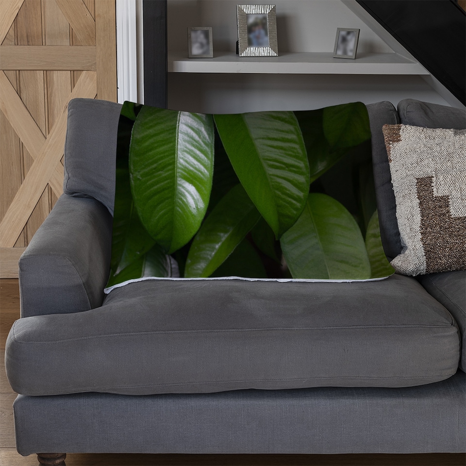image 1 of Closeup of beautiful glossy green leaves Designer Blanket | Multi