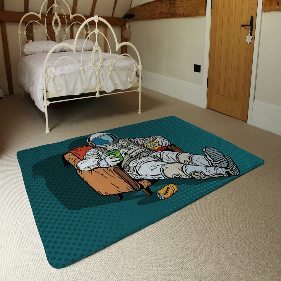 image 1 of Astronaut the audience with beer and popcorn sitting in a chair. loneliness in space. Pop art retro (Rug) Cream | S