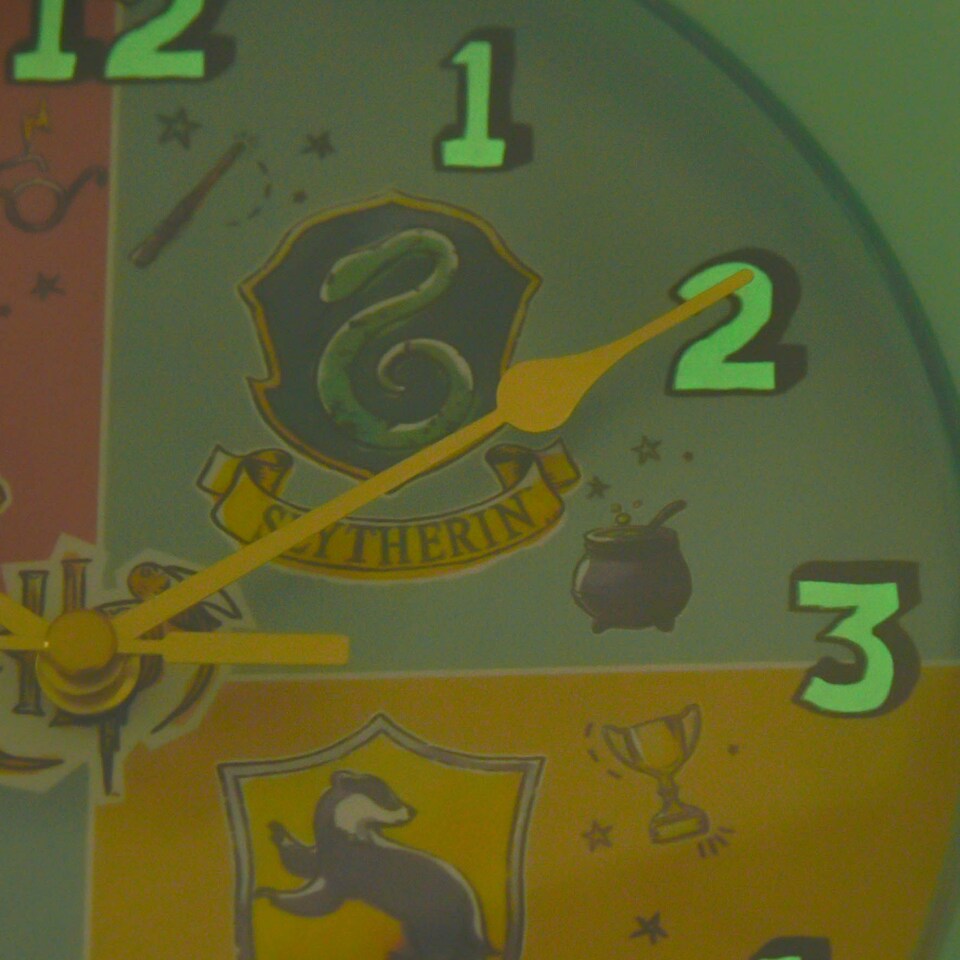 image 1 of Harry Potter Charms Wall Clock - House Crests N/A | Turquoise