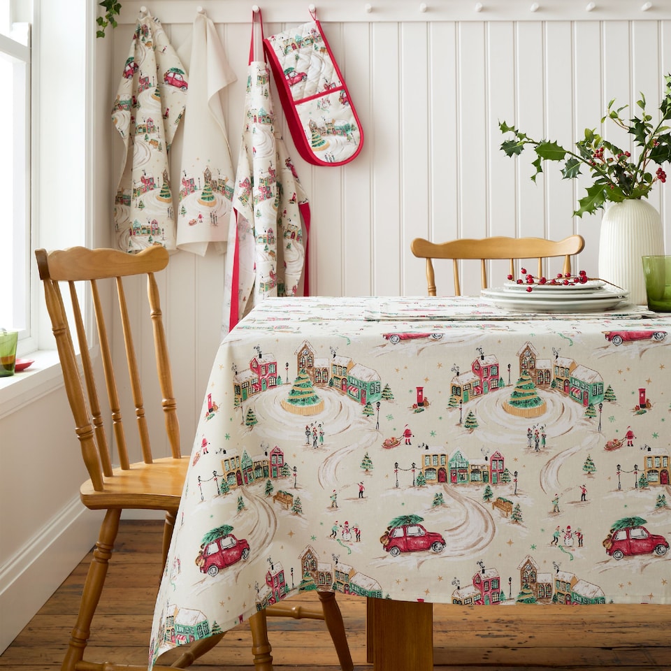 image 1 of Catherine Lansfield Christmas Town Cotton Table Cloth | Cream | Natural | 137 x 178 cm
