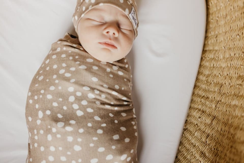 image 1 of Copper Pearl Knitted Swaddle Blanket Fawn