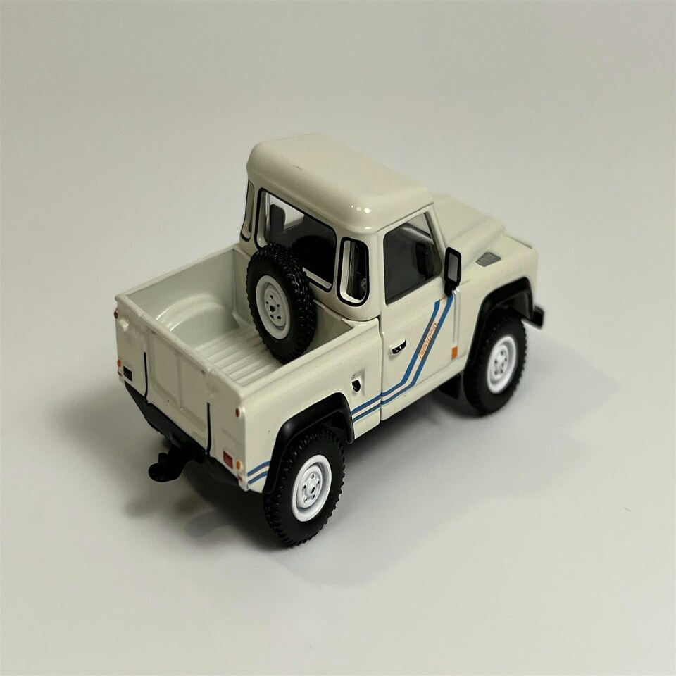 image 1 of Land Rover Defender 90 Pick Up White 1:64 Scale Mini GT MGT00338L