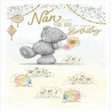 Bear With Flowers Behind Back Nan Birthday Card