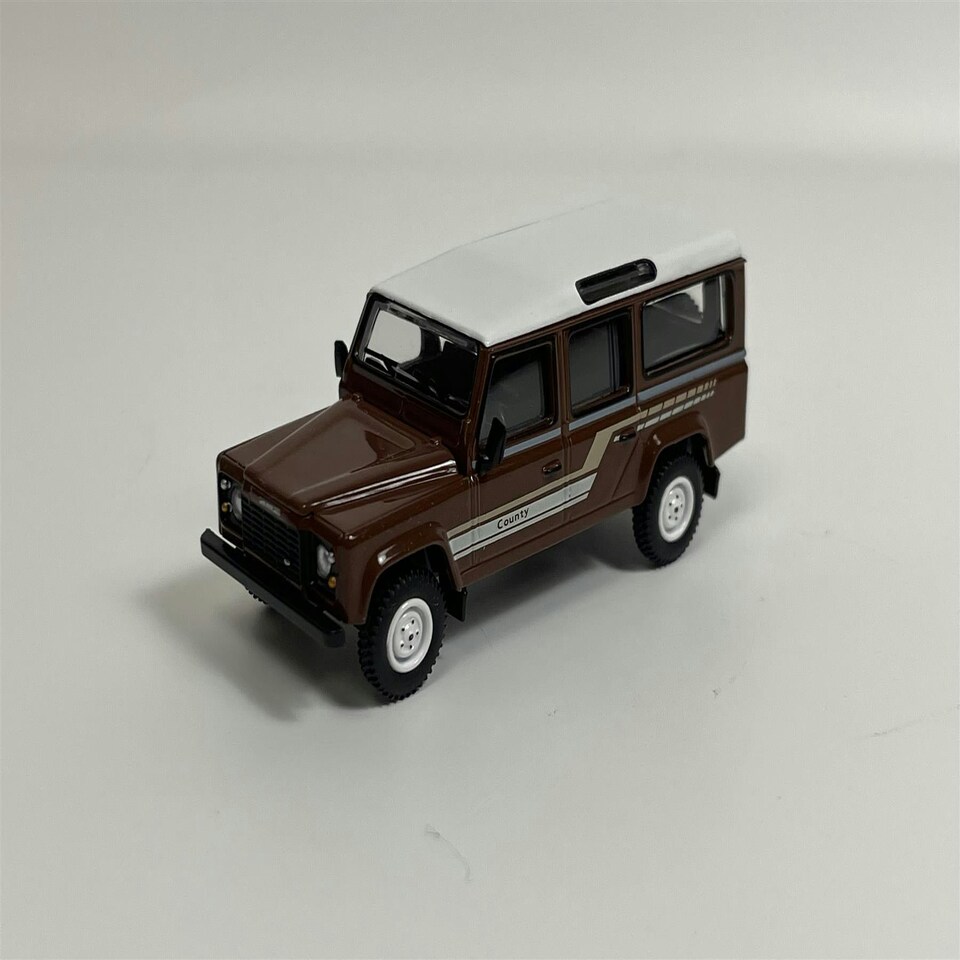 image 1 of Land Rover Defender 110 1985 County Station Wagon Russet Brown LHD 1:64 Mini GT MGT00734L