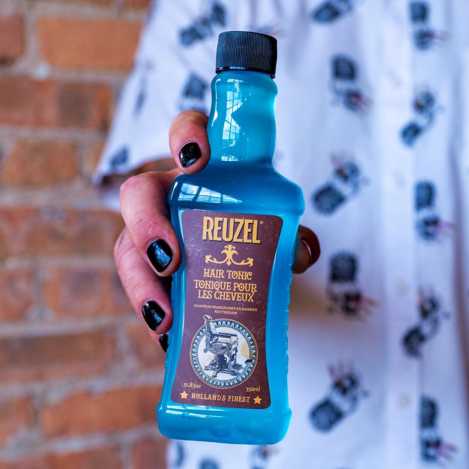 image 1 of Reuzel Hair Tonic Oil Free Formula Won't Weigh Hair Down Nostalgic Barbershop Fragrance Restores Healthy, Natural Looking Shine Can Be Used as a Cutting Lotion on Wet Hair 500 ml | Multi | Can you make a product discription for this product please