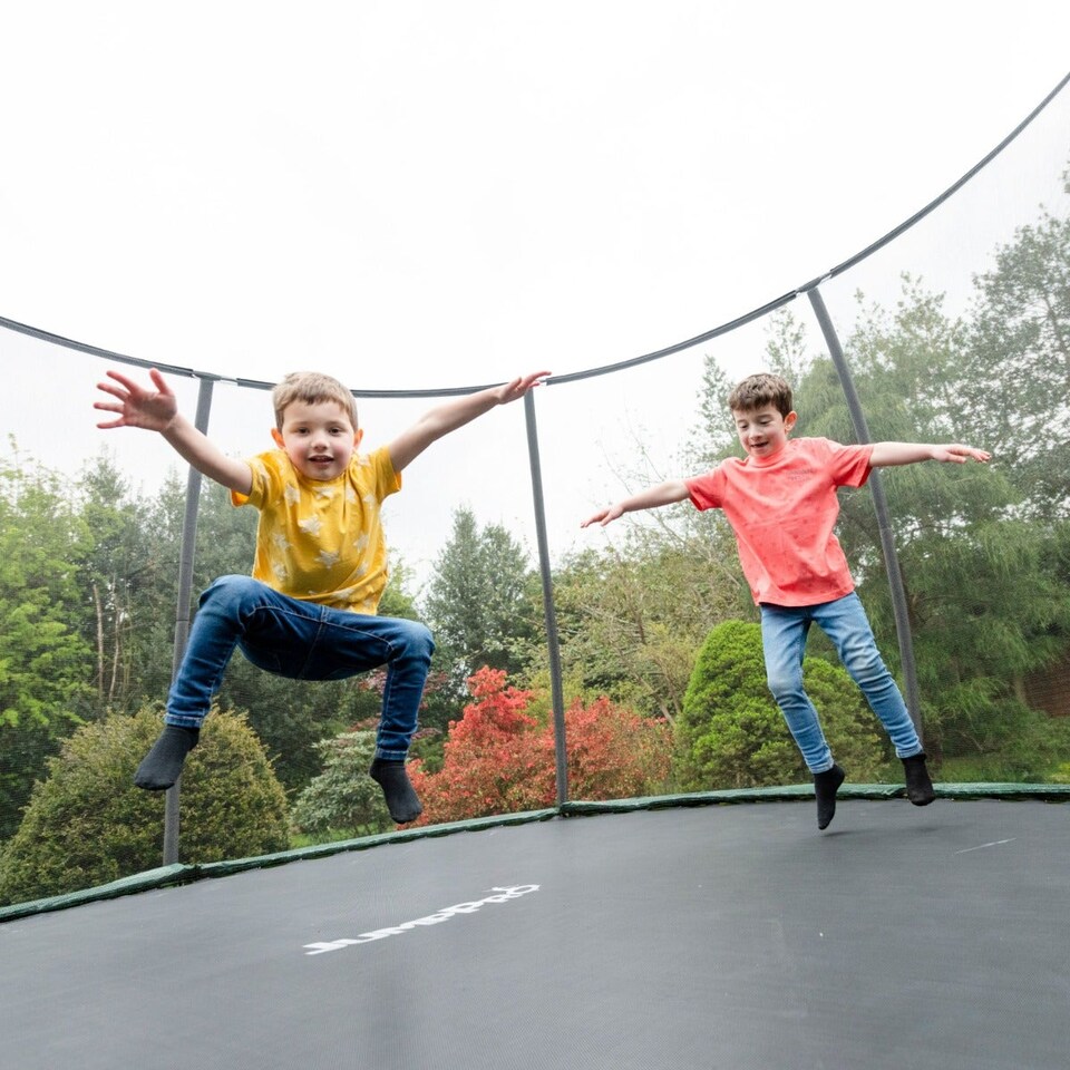 image 1 of JumpPRO® Xcite 14ft Green Round Trampoline with Enclosure