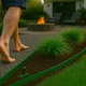 image 7 of Harbour Housewares Flexible Plastic Lawn Edging with 120 Pegs & Mallet - 30m x 4cm - Green | Green | 3