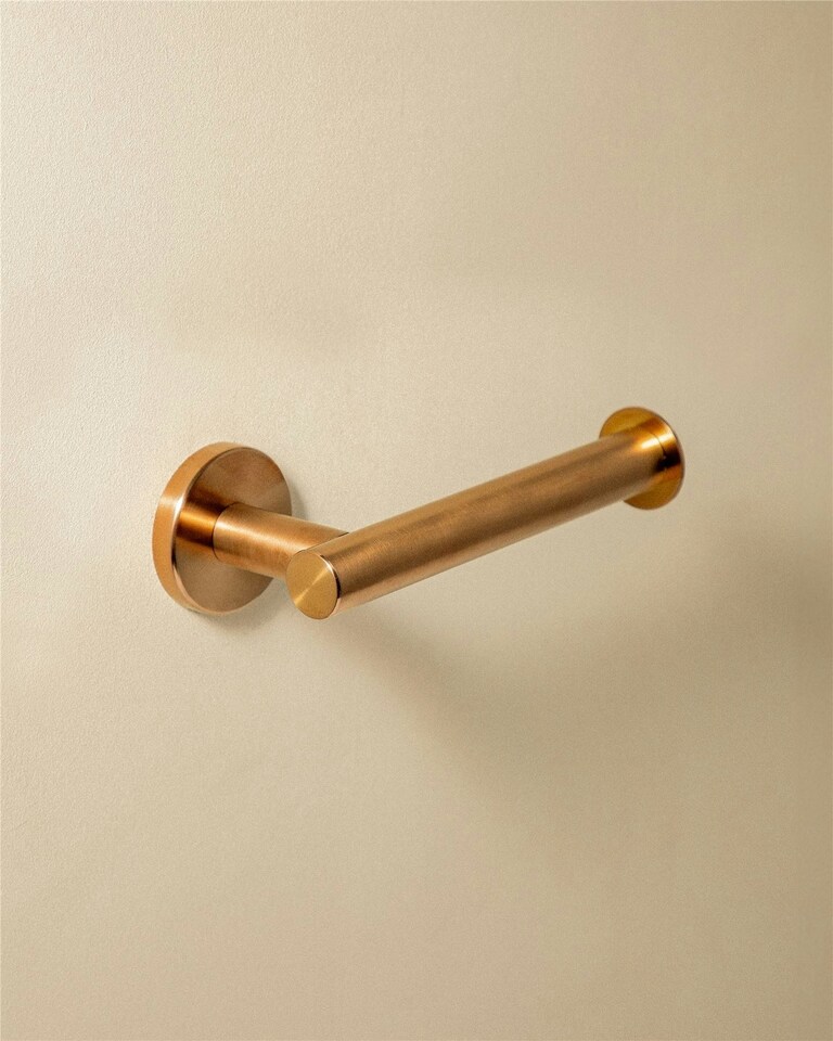 image 1 of Cosmic Wall Mounted Toilet Roll Holder with Durable Metal Copper Finish