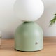 image 1 of ValueLights Marlow Dimmable Painted Green Table Lamp with White Globe Shade and Integrated LED 2W White Mix 3000K Bulb | Green