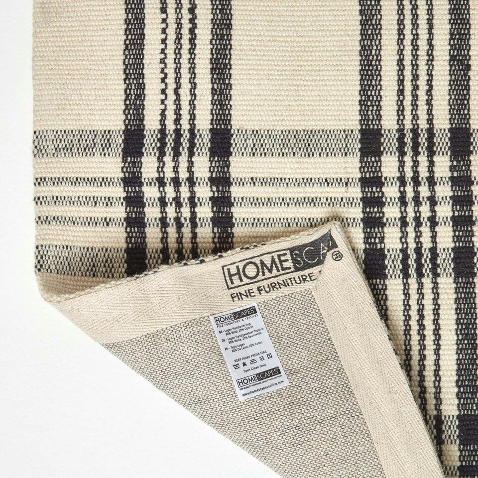 image 1 of Homescapes Logan Black and White Tartan Check Non-Slip 100% Wool Rug - 70 x 120 cm Black | 70 x 120 cm