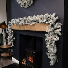 2.7m Green Snow Flocked Christmas Garland with 190 Tips