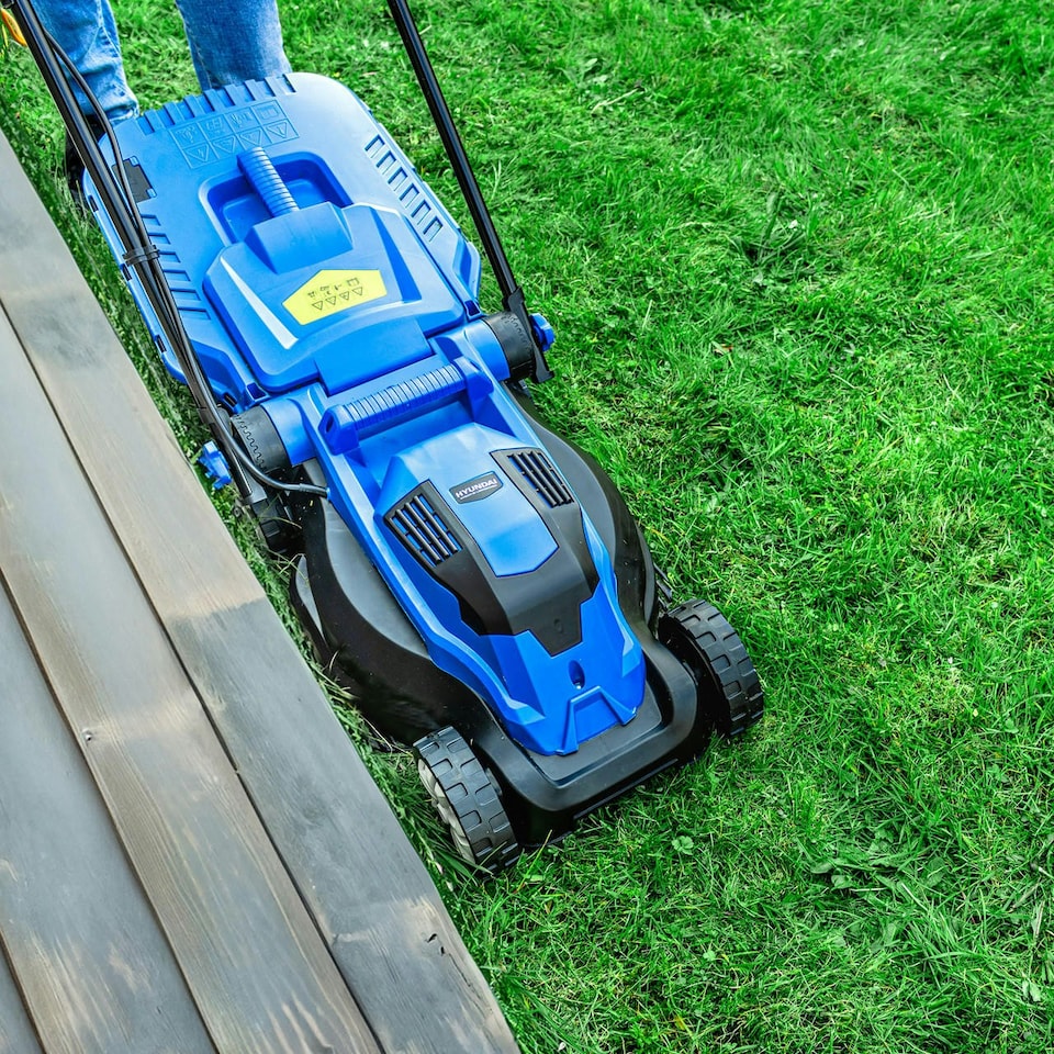 image 1 of Hyundai 33cm 1300W Electric Lawn Mower, 11m Detachable Power Cable, 3 Heights & 30L Collection Bag | HYM3313E