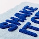 image 4 of Shake It Off Slogan Scalloped Bath Mat