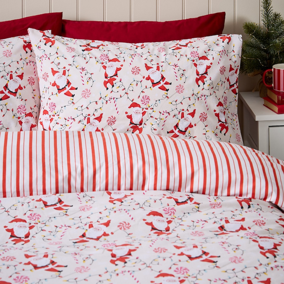 image 1 of Catherine Lansfield Christmas Santas Reversible Duvet Cover Set