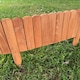 image 6 of Wooden Log Roll Style Garden Lawn Edging (70cm x 20cm) - 6 Panels