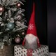 image 1 of 74cm Festive Christmas Sitting Bearded Gonk with Dangly Legs in Red Hat