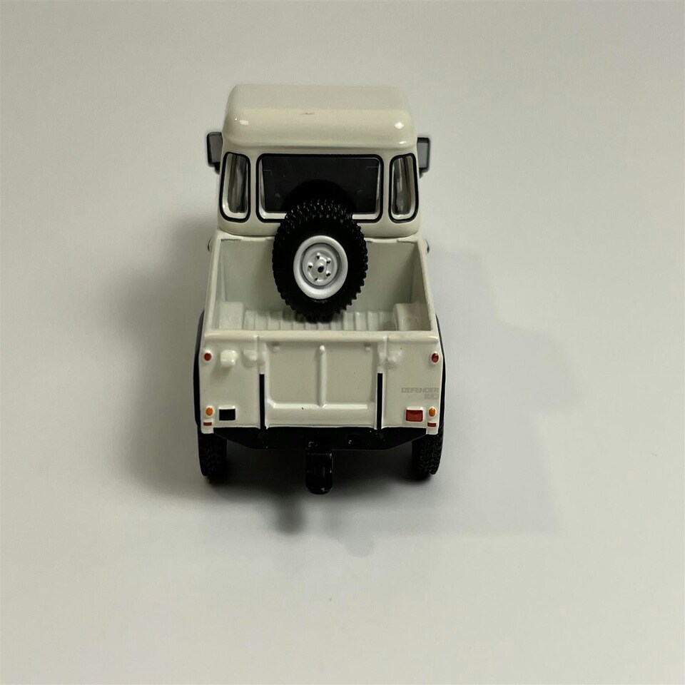 image 1 of Land Rover Defender 90 Pick Up White 1:64 Scale Mini GT MGT00338L