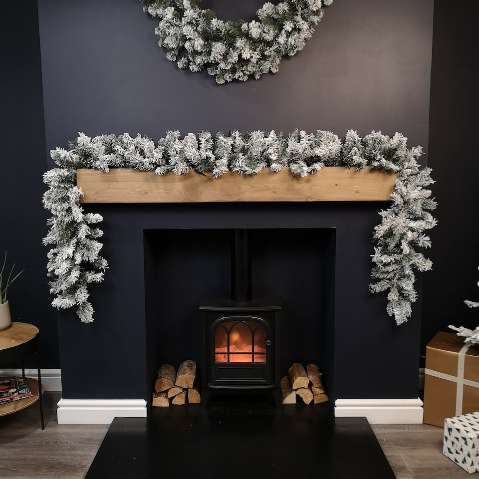 image 1 of 2.7m Green Snow Flocked Christmas Garland with 190 Tips