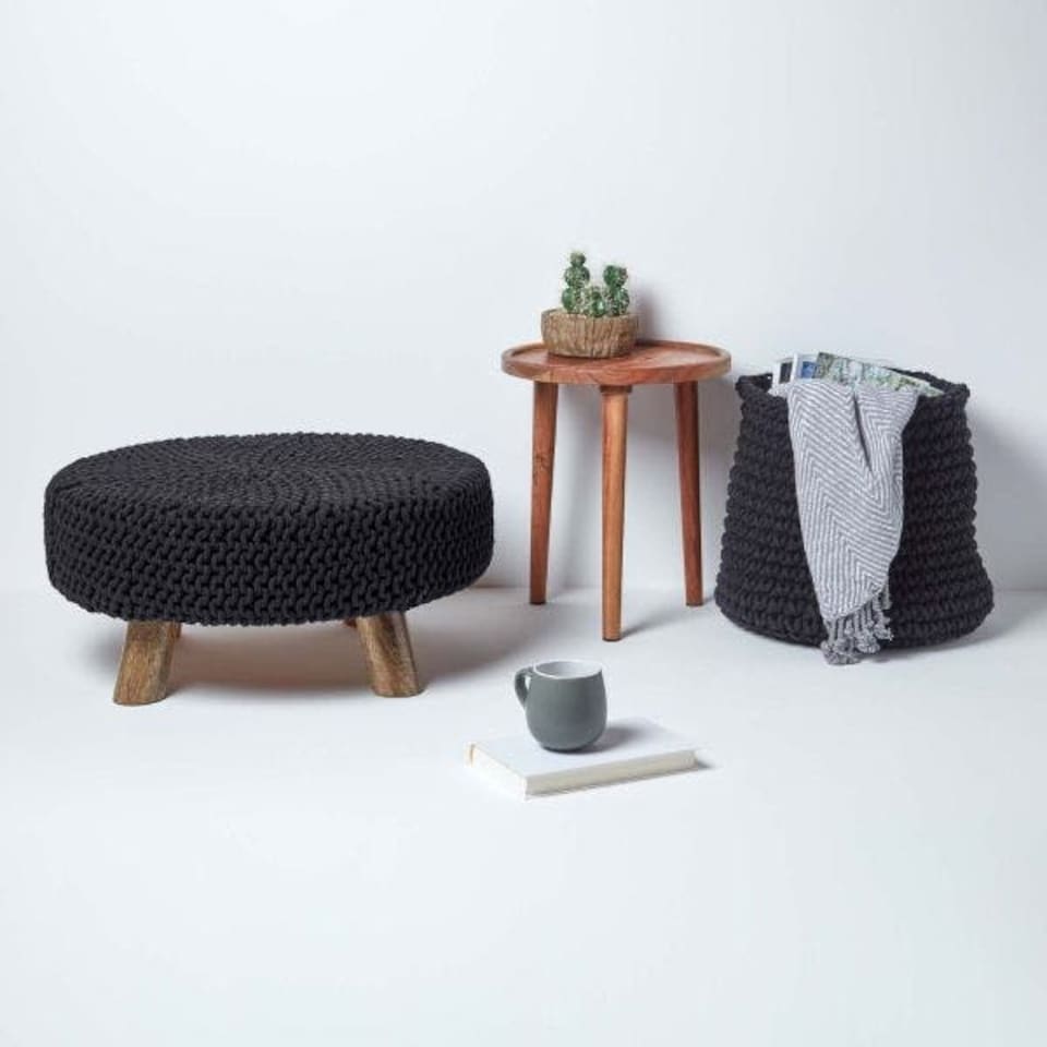 image 1 of Homescapes Black Large Round Cotton Knitted Footstool on Legs | Black | 62 x 62 x 30 cm