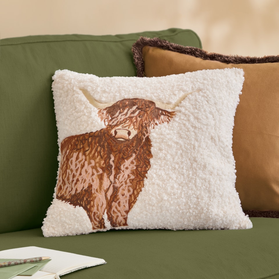 image 1 of Evans Lichfield Boucle Highland Cow Embroidered Cushion