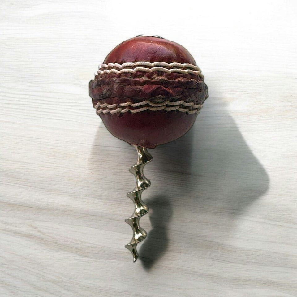 image 1 of CRICKET-GIFTS - Mini Cricket Ball Wine Opener | Hand Made in UK | 4cm Ball & Metal Auger | Easy Wine Cork Removal | Not for Synthetic Corks