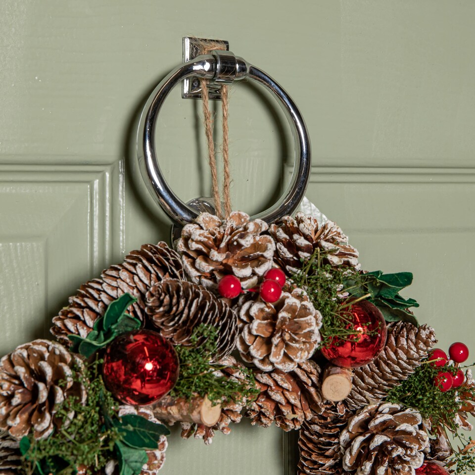 image 1 of 30cm Hanging Christmas YuleFest Wreath with Red Baubles & Snow Tipped Pine Cones