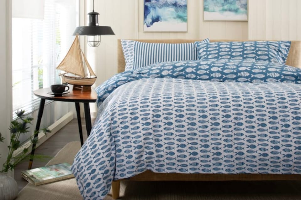 image 1 of Small Fish  Cotton Duvet Set with Stripe Reverse & Printed Fabric Bag | Multi | Super King