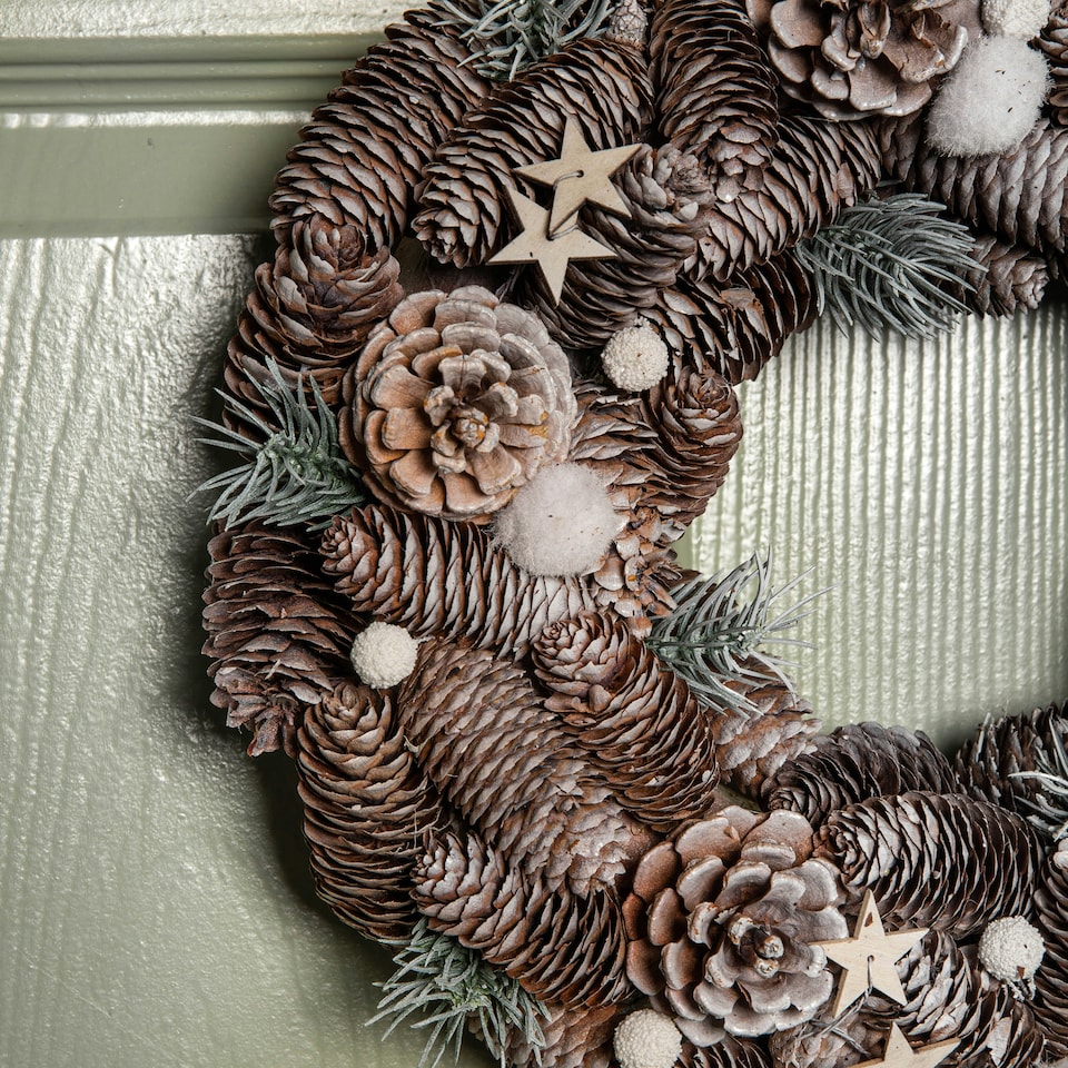 image 1 of 36cm Frosted Hanging Christmas Wreath with Pine Cones & Wooden Stars