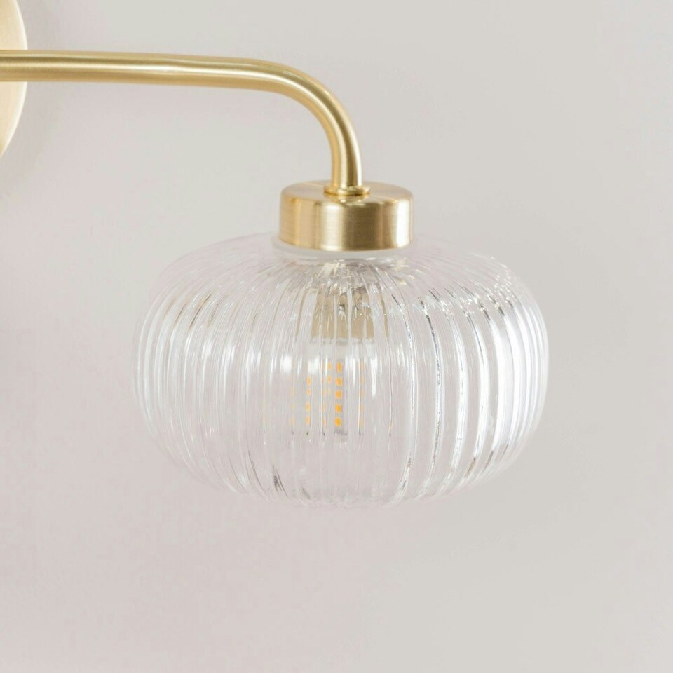 image 1 of ValueLights Amaia Brushed Gold IP44 Rated 2 Way Clear Ribbed Glass Wall Light