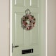 image 3 of 30cm Hanging Christmas YuleFest Wreath with Red Baubles & Snow Tipped Pine Cones