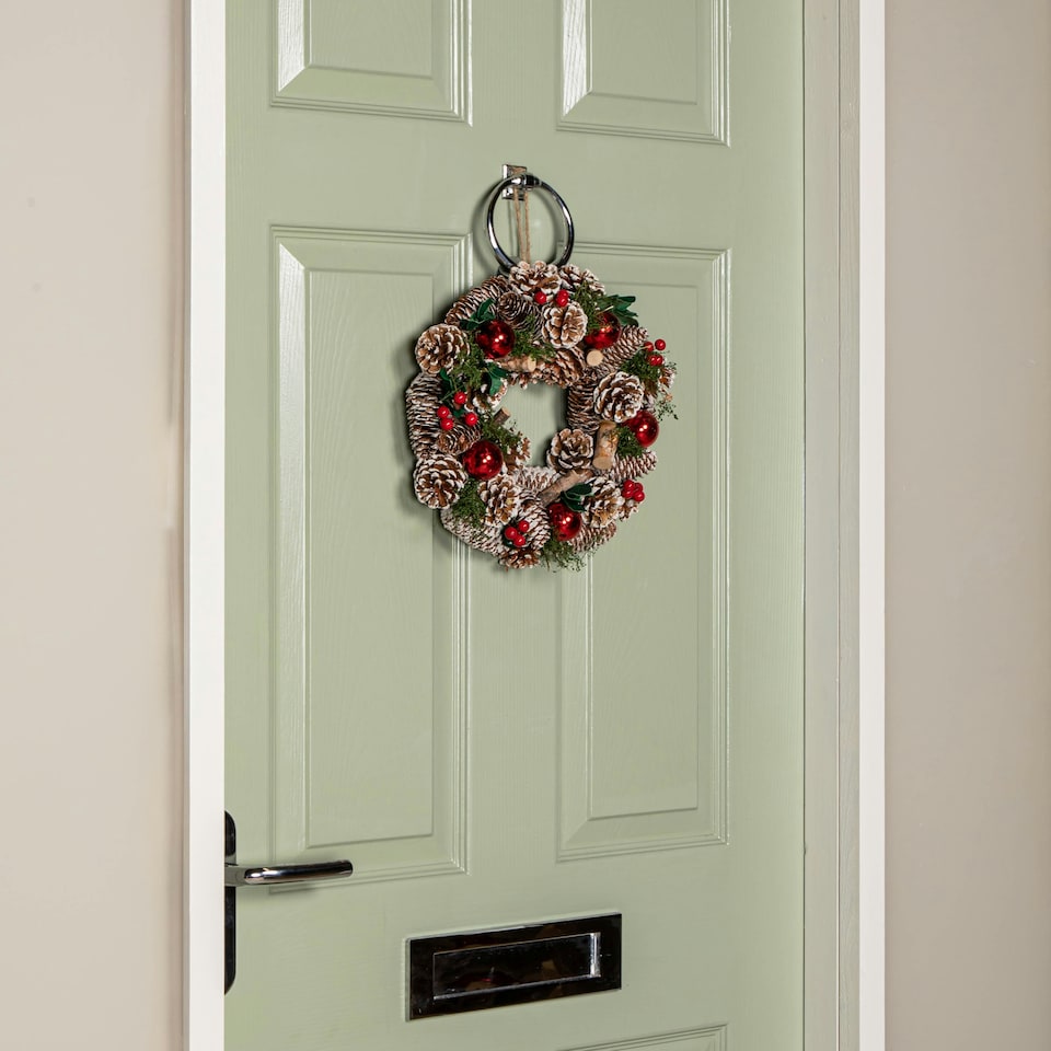 image 1 of 30cm Hanging Christmas YuleFest Wreath with Red Baubles & Snow Tipped Pine Cones
