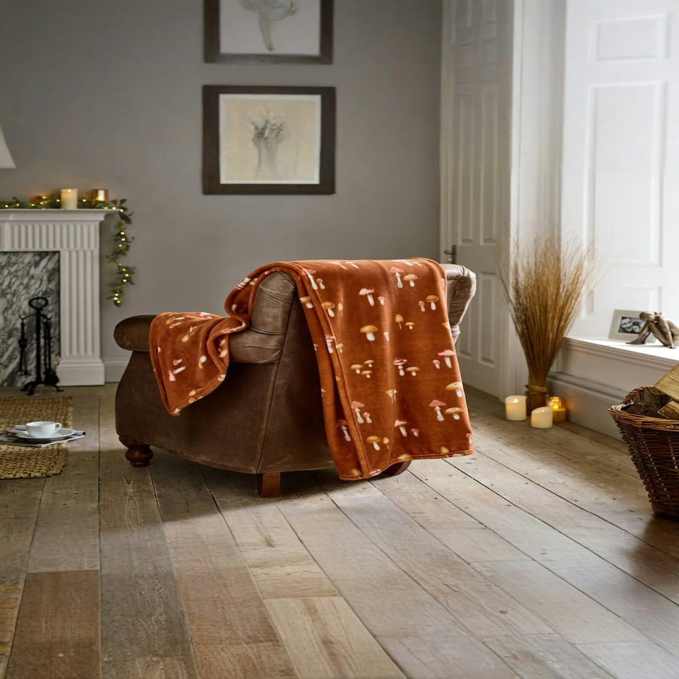 image 1 of Toadstool Scatter Throw – Rust Coloured Blanket Decorated with Mushroom Motifs 140x180cm Multi | Rust