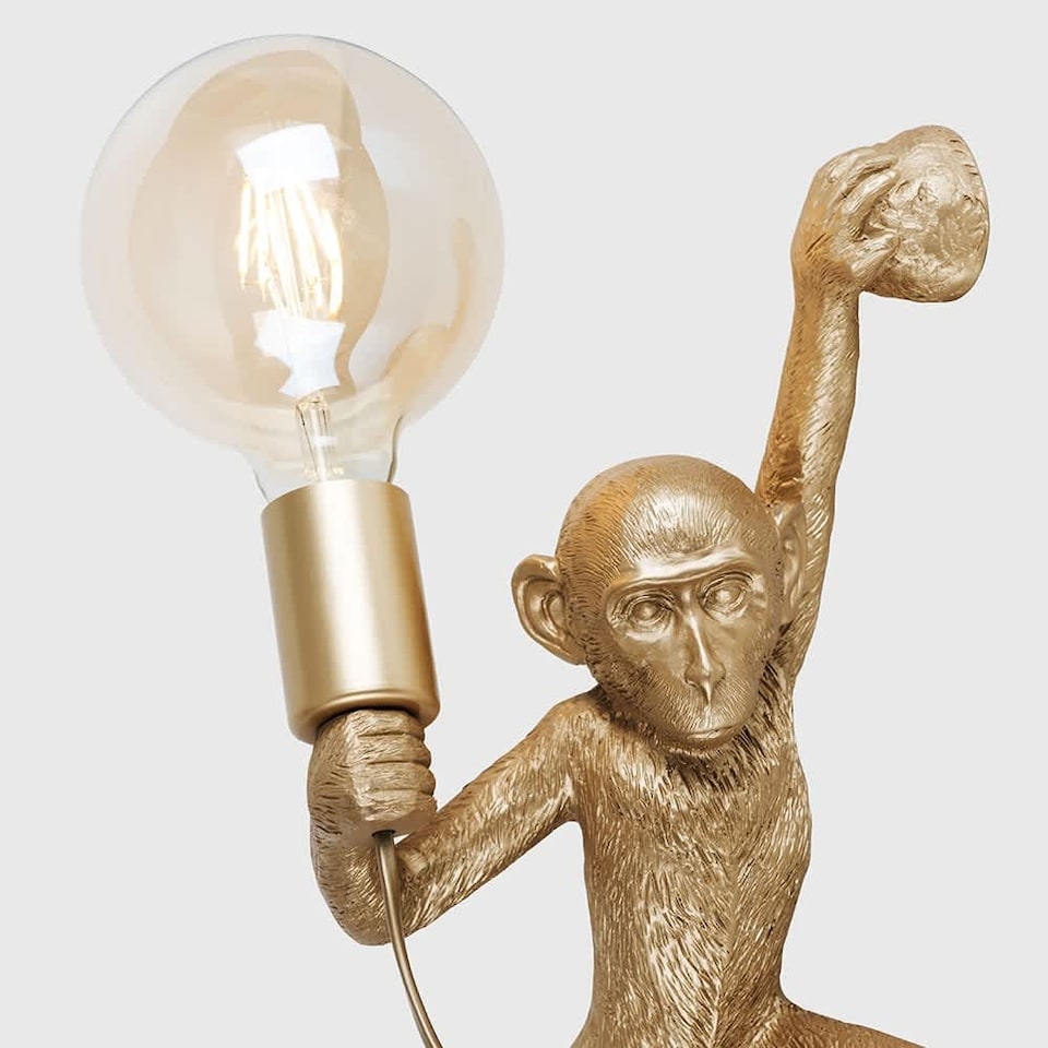 image 1 of ValueLights George Monkey Holding a Light Bulb Wall Light Gold | Gold