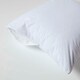 image 4 of Homescapes Terry Towelling Waterproof Pillow Protectors - 60 x 60 cm - Pack of 4 White