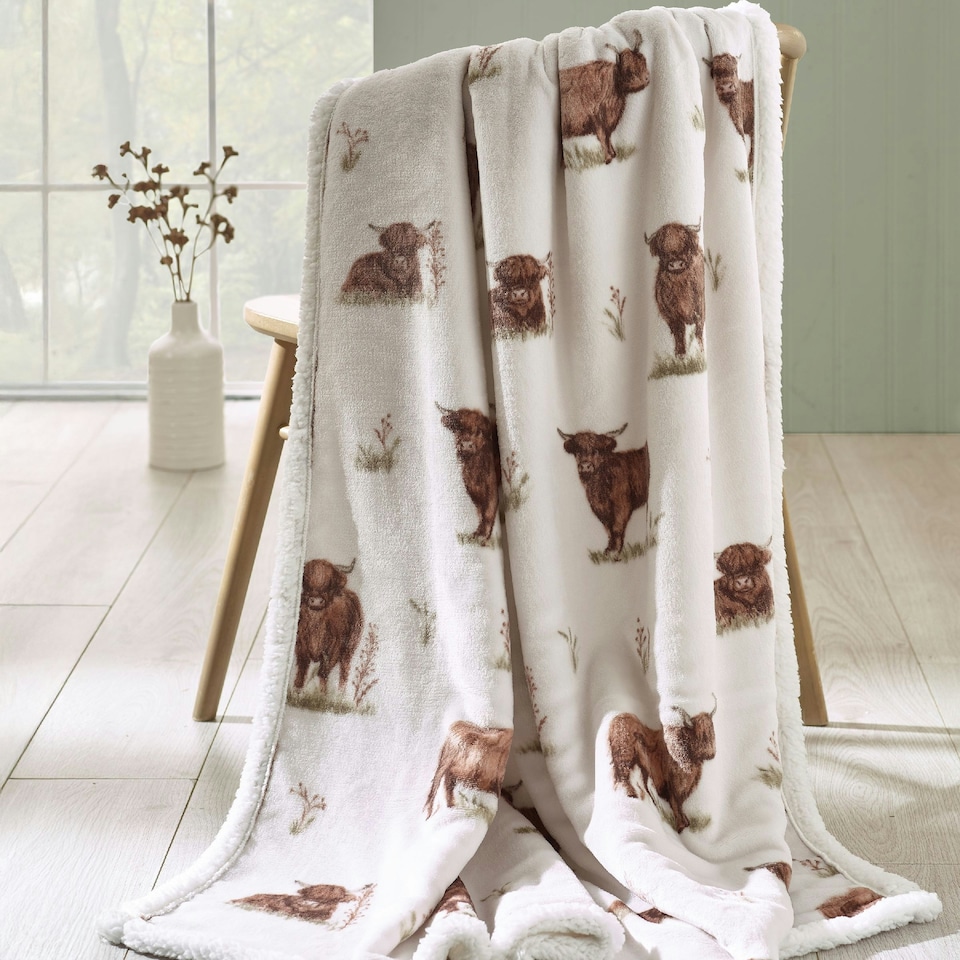 image 1 of Catherine Lansfield Angus Highland Cow Cosy Fleece 130x170cm Blanket Throw Natural | Cream | Natural | One Size