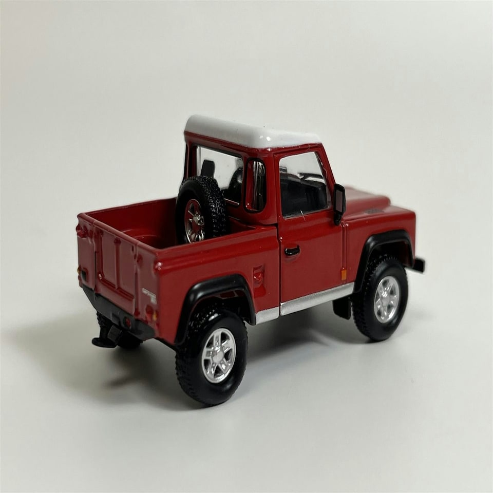 image 1 of Land Rover Defender 90 Pickup Masai Red LHD 1:64 Scale Mini GT MGT00323L