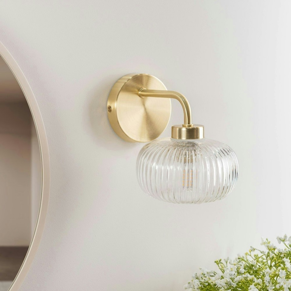 image 1 of ValueLights Amaia Pair of Brushed Gold IP44 Clear Ribbed Glass Wall Lights with LED Bulbs
