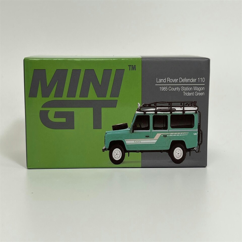 image 1 of Land Rover Defender 110 1985 County Station Wagon Green RHD 1:64 Mini GT MGT00590R