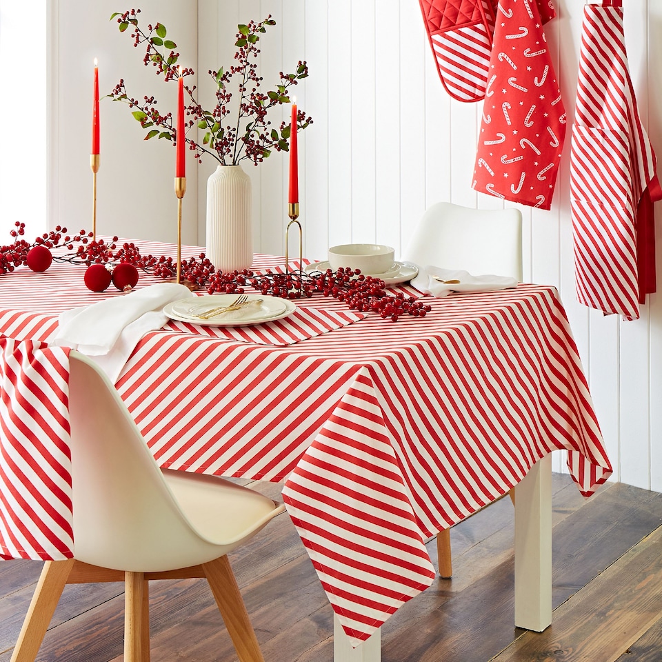 image 1 of Catherine Lansfield Christmas Candy Cane Cotton Table Cloth | Red | 137 x 229 cm
