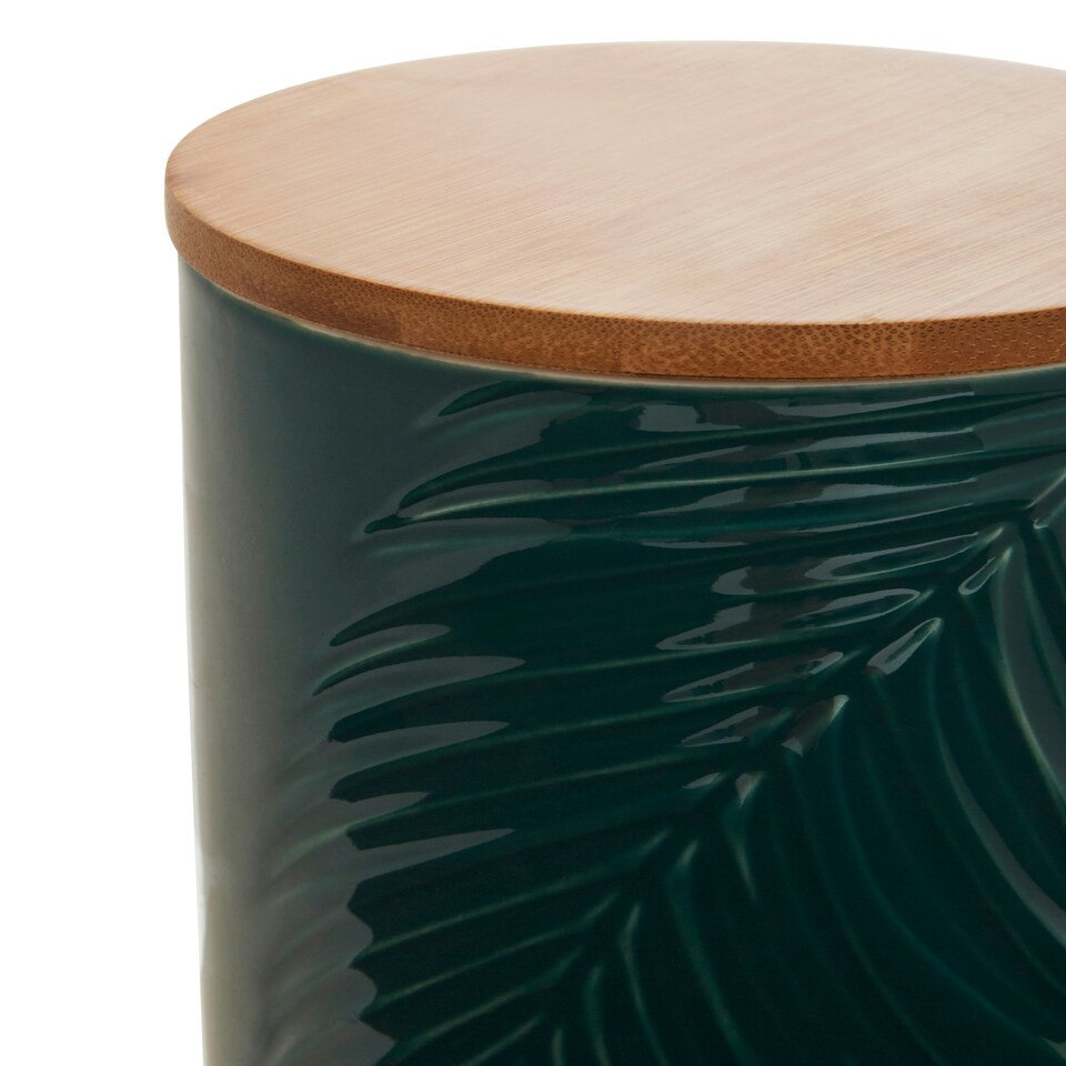 image 1 of Interiors By Premier Dark Green Large Storage Jar With Bamboo Lid,Jar With Embossed Tropical Leaf Design,Spice Storage Canister
